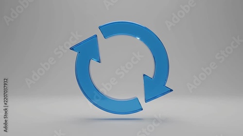 Blue Glossy Recycling Symbol Rotating in 3D Studio Space