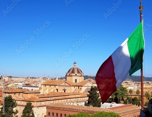 Vibrant Italian Flag Over Rome Cityscape
