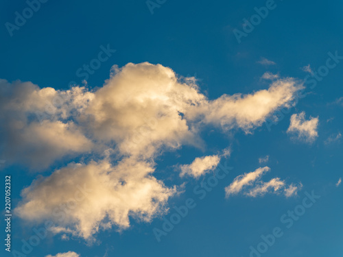 Large puffy clouds in the blue sky