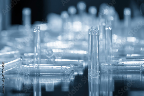 Healthcare plastic parts mass production by an injection molding process in a blue tone scene