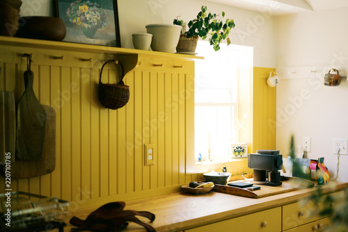 real imperfect kitchen with yellow cabinetry
