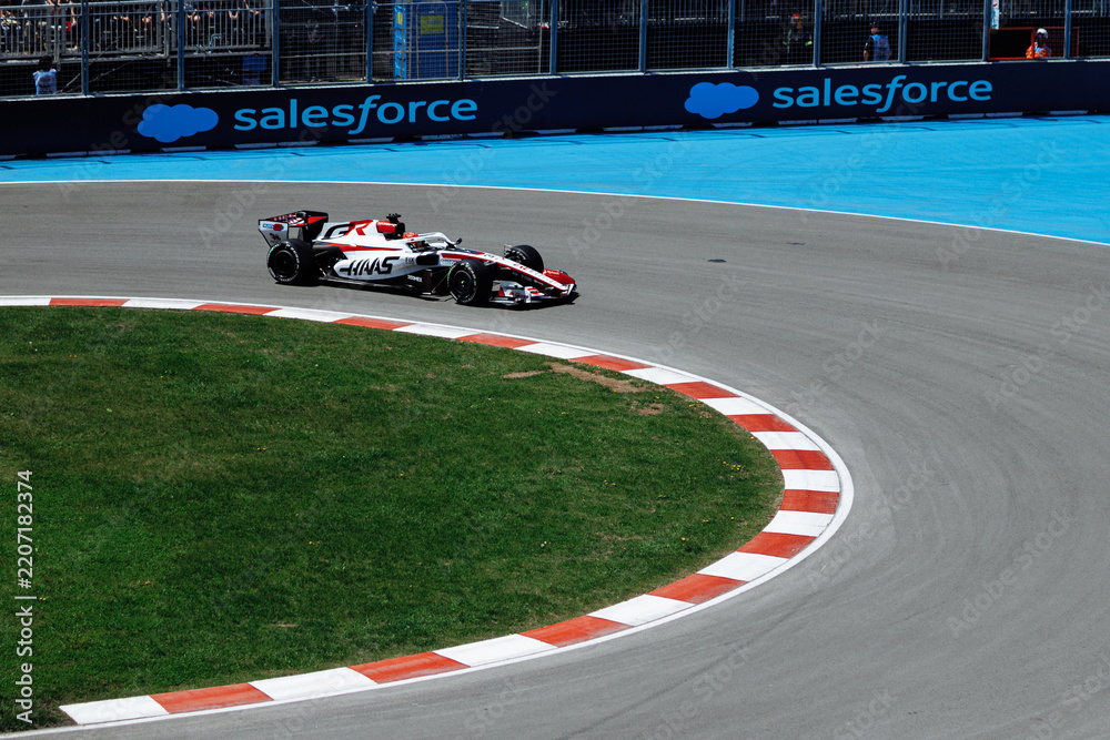 Obraz premium May 24, 2026, Montreal, Canada, Esteban Ocon races a Haas F1 car at Circuit Gilles-Villeneuve. g.