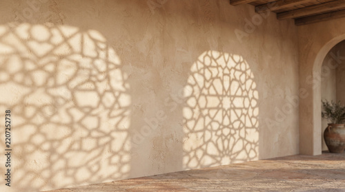 Geometric sunlight shadows on a warm plaster courtyard wall
