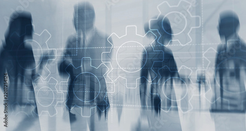 Business process automation concept with mechanical gears and digital icons on abstract blue background
