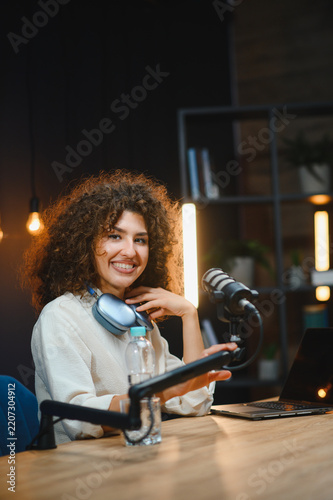 Content creator recording a podcast in home studio