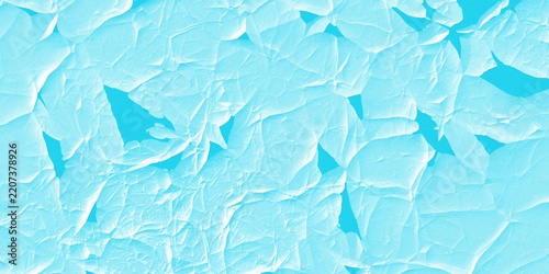 Bright cyan abstract textured surface with sharp shadows and crinkled appearance