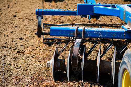 Fotografie Harrow blades support spring soil preparation