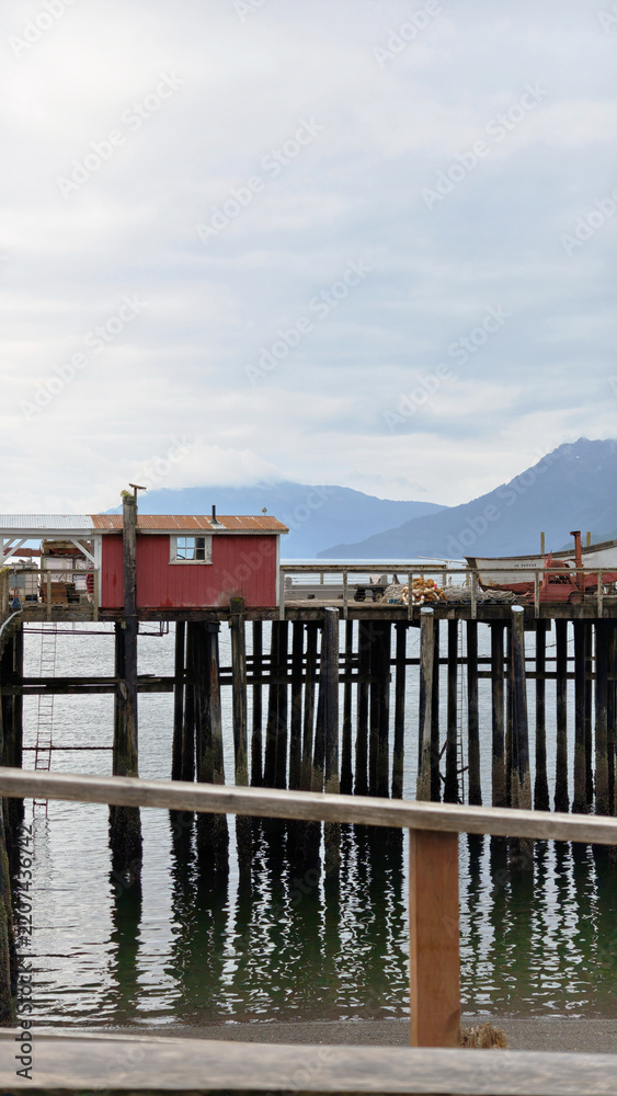 Fototapeta premium Wooden Boardwalk and Pier at Icy Strait Point Alaska