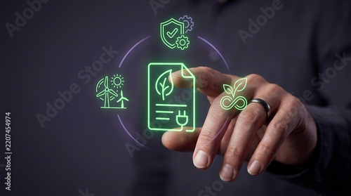 Close-up of a businessman's hand interacting with glowing green neon icons representing environmental sustainability and green energy renewable goals.