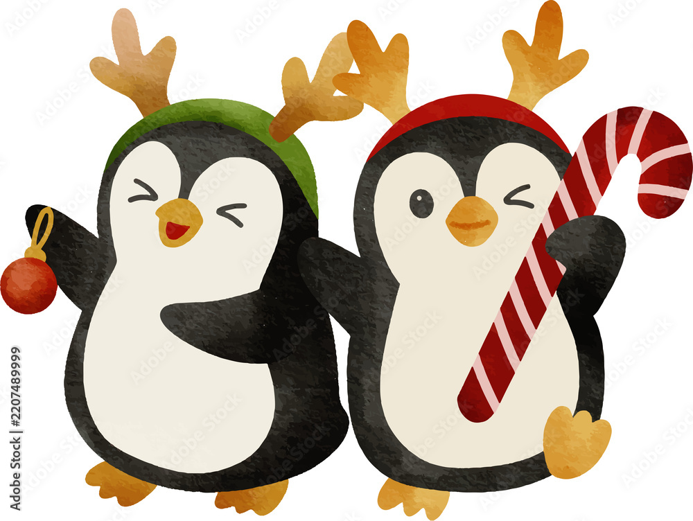 Fototapeta premium Cute cartoon penguins wearing reindeer antlers and festive hats one holding a Christmas ornament and the other a candy cane celebrating winter holidays