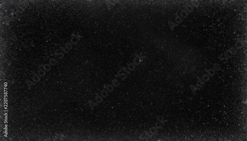 Obraz na plátně Dark abstract background with fine white dust, winter frost, snow frame, grunge noise and vintage film grain texture, ideal for seasonal designs, posters, overlays, photography and creative projects