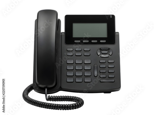 Black office telephone with a corded handset isolated on a white background