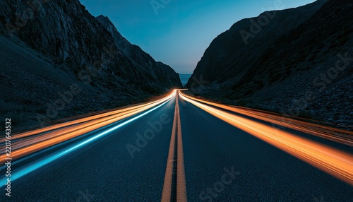 Long Exposure Night Drive Through Mountain Pass with Light Trails.