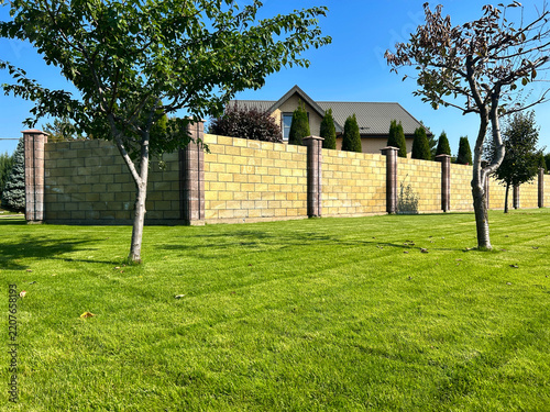 Evenly mown grass on a private residential plot.