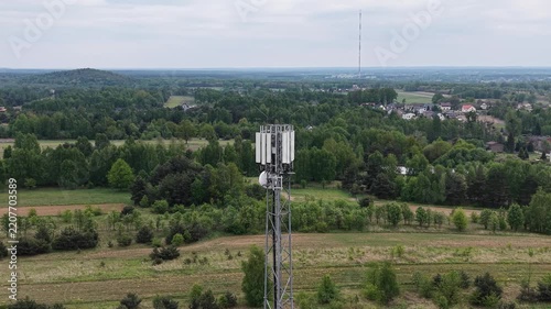 5G network transmitter mast standing in open landscape