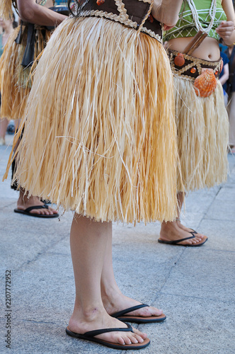 Dancers performing and wearing traditional folk costumes from Guam Island