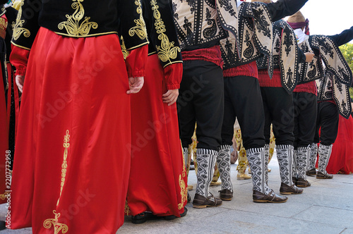 Dancers performing and wearing traditional folk costumes from Turkey