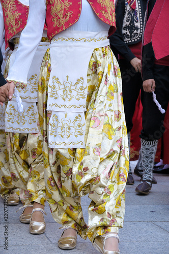 Dancers performing and wearing traditional folk costumes from Turkey