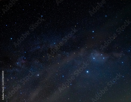 clear night sky filled with numerous bright stars and visible sections of the milky way galaxy