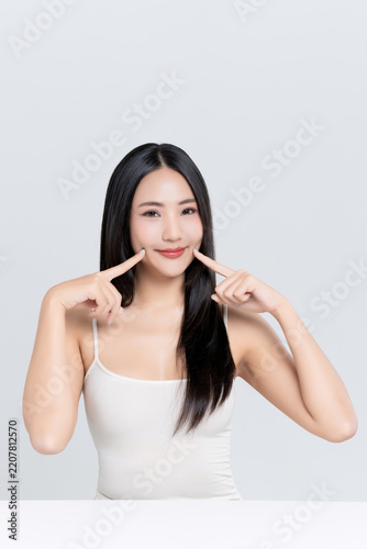 Beautiful young Asian woman with cuteness and beauty face natural makeup isolated on white background, perfectly woman, self care and wellness concept.