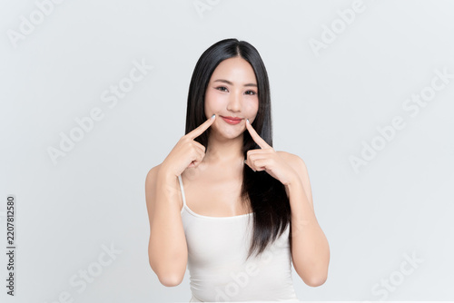 Beautiful young Asian woman with cuteness and beauty face natural makeup isolated on white background, perfectly woman, self care and wellness concept.