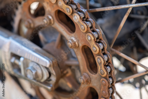 Close up of a chain and sprocket on a motorcycle