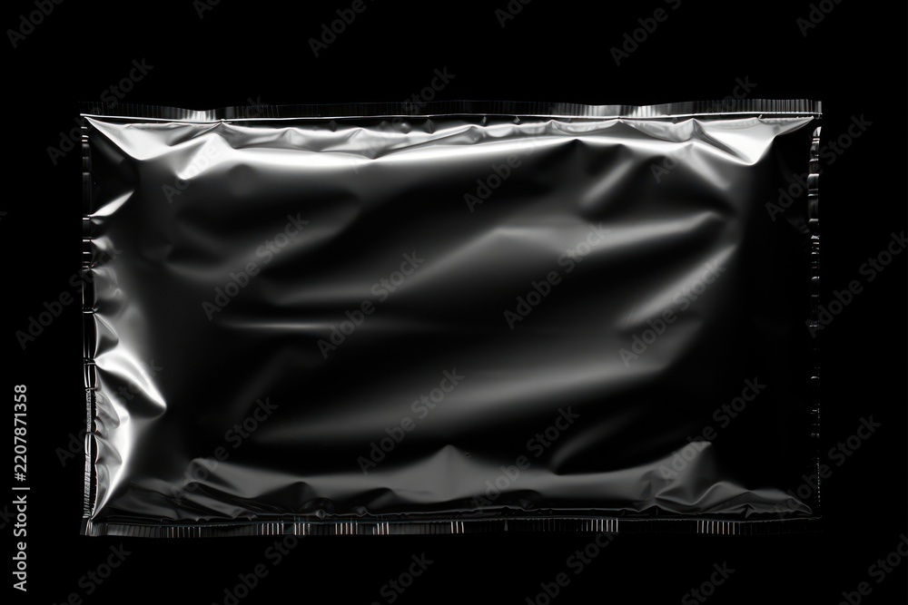 Fototapeta premium Black plastic wrap black background monochrome aluminium.