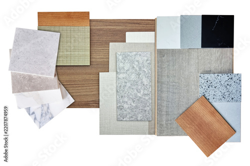 interior material board containing ash and oak veneers, fabric laminateds, grainy quartz stone, oak laminated, interior fabric wallpaper samples isolated on background with clipping path.