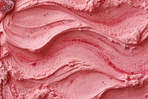 Pink strawberry ice cream background texture with frozen sweet dessert