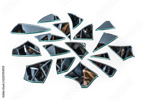 Scattered shards of broken mirror glass with sharp edges isolated on white background