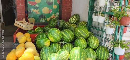 Fresh Watermelons and Melons Sprayed with Water at a Local Produce Stand in Nis, Serbia
