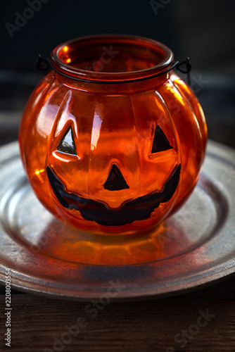 Halloween pumpkin lantern on a plate