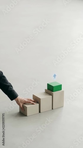 Crisis management with human hand guiding green cube block across ascending steps toward strategic growth, recovery planning, progress,