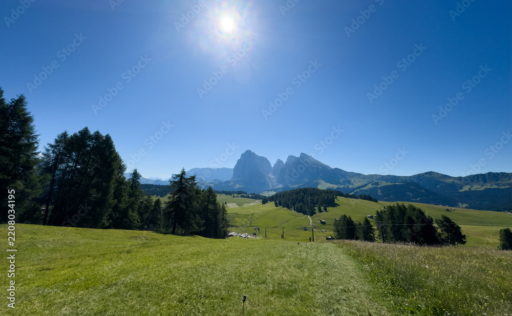 Obraz premium Alpe di Siusi at sunny morning sunrise, Dolomites mountains, Italy