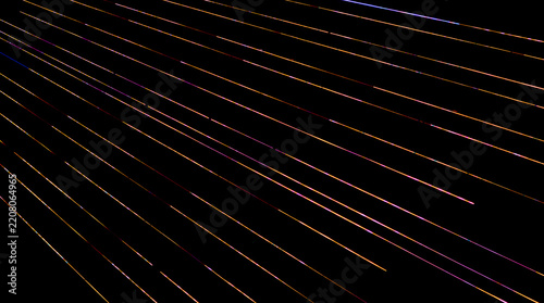 bright colorful light trails against a black background