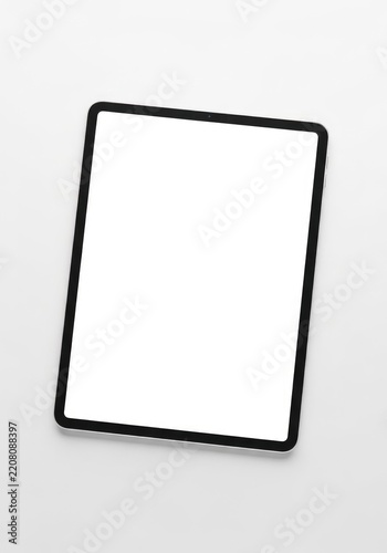 A high resolution studio shot of a modern digital tablet featuring a blank white screen isolated on a clean white background for mockup, device, background, minimalist