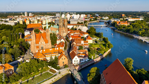 Panoramic aerial view of Cathedral Island Ostrow Tumski at Odra River with Saint John Baptist Cathedral and historic old town district of Wroclaw in Poland