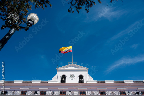 Carondelet Palace with Ecuador Flag under Blue Sky in Quito