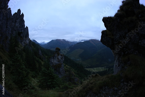 Moody summer landscape of Bobrowiec peak, Mnichy Chochołowskie, and Skorusi Źleb enveloped in mist and rain, Tatra Mountains