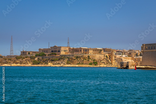Exposure done by the sea shore in Valletta, showing the beautiful sea color and the typical construction, Malta