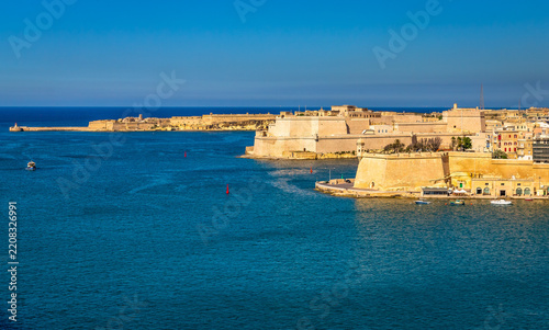 Exposure done by the sea shore in Valletta, showing the beautiful sea color and the typical construction, Malta