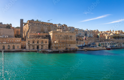Exposure done by the sea shore in Valletta, showing the beautiful sea color and the typical construction, Malta