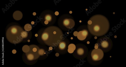 Fotografie Soft out-of-focus light orbs float at the top of the dark frame