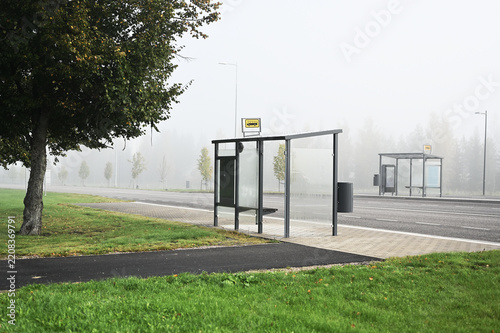 Obraz na plátně A quiet Finnish bus stop on a foggy autumn morning