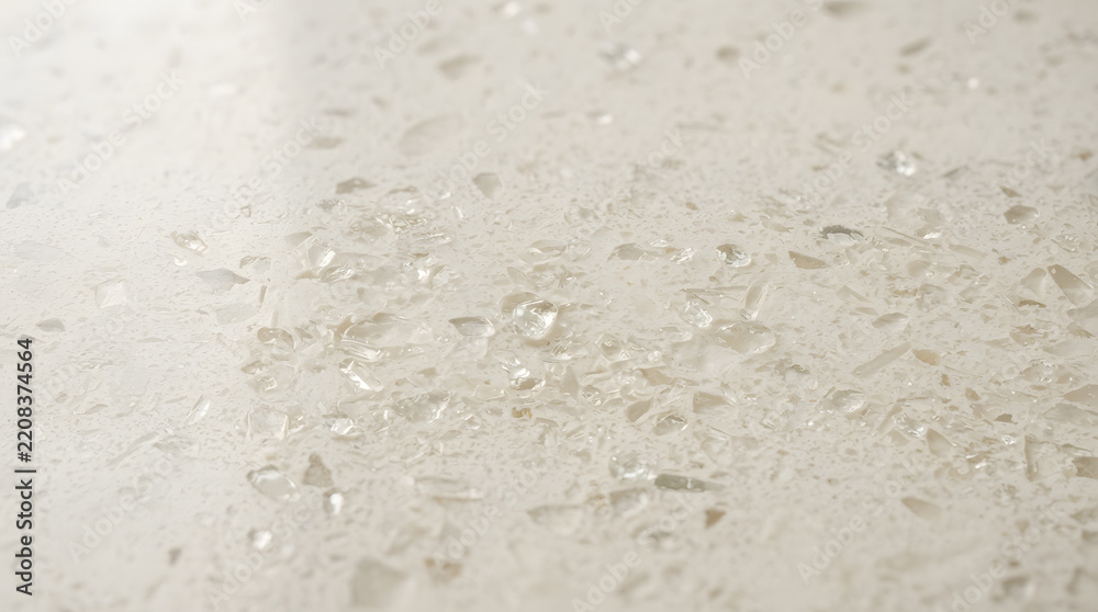 Fototapeta premium Mineral Composite Surface Close-Up, Textured Stone Material with Embedded Glass Particles, Modern Design Element for Countertops and Interiors.