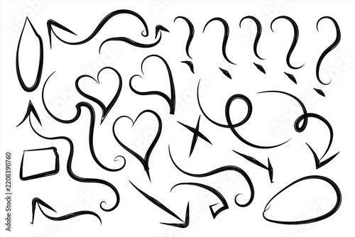 Set of hand drawn design elements created with a rough ink brush featuring arrows hearts and swirls