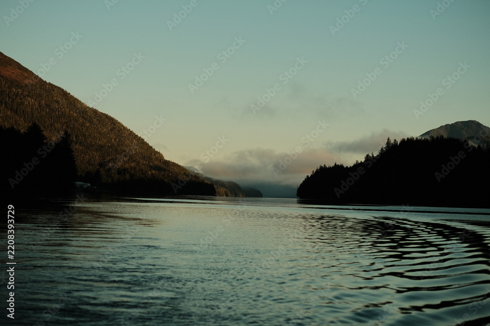 Obraz premium Mountain inlet at sunset