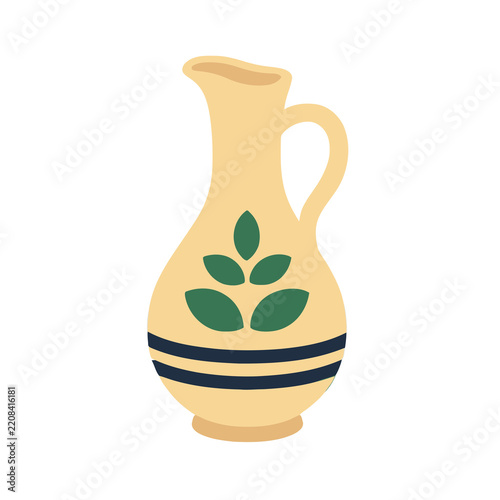 Yellow jug with green leaves and blue stripes