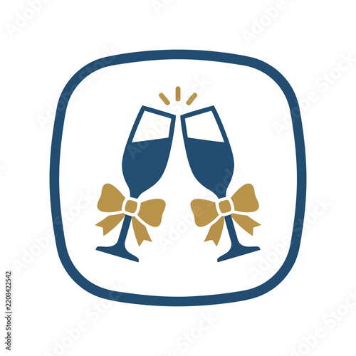 Two champagne glasses clinking with bows