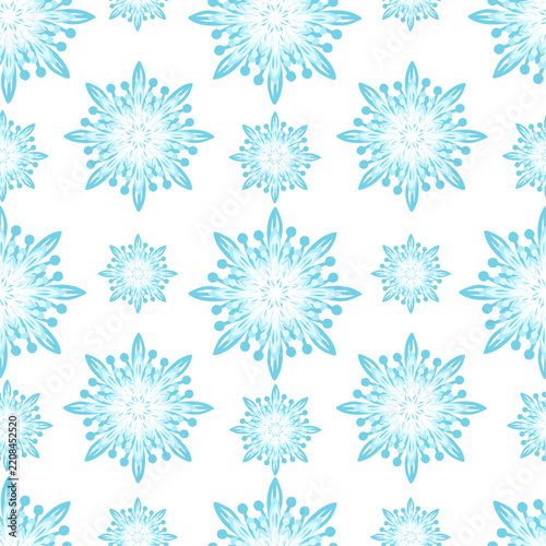 Seamless winter pattern with snowflakes. Vector graphics.